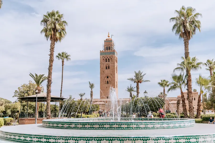 The Koutoubia minaret rising above palm trees in Marrakech